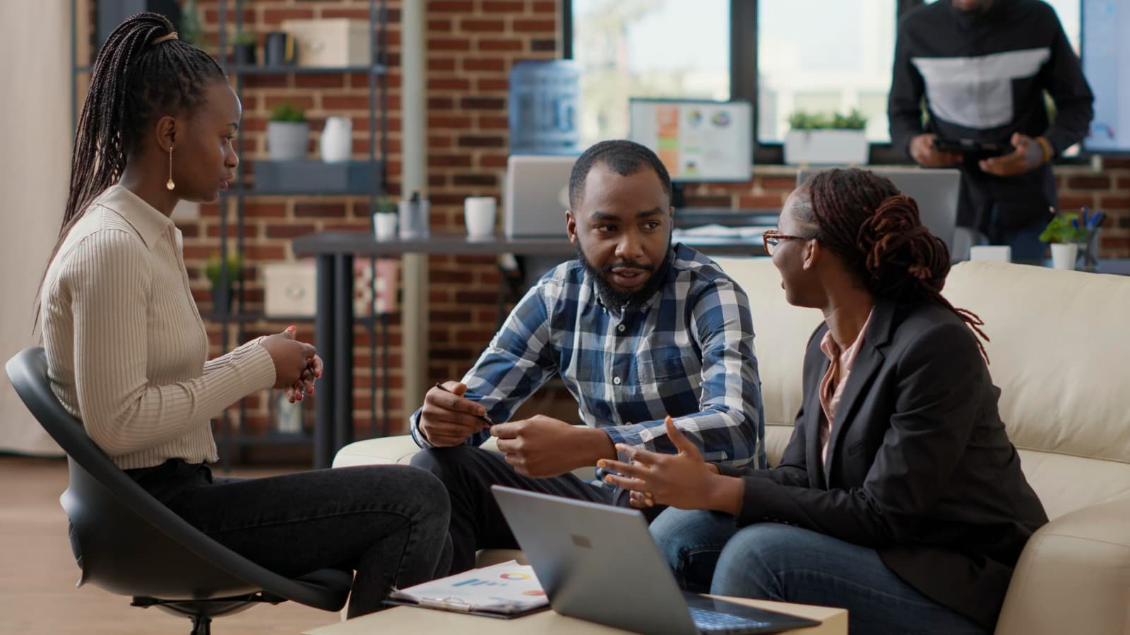 Business leaders in conversation at a modern office